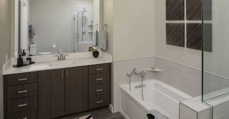 Spa bathrooms with ceramic tile floors & showers
